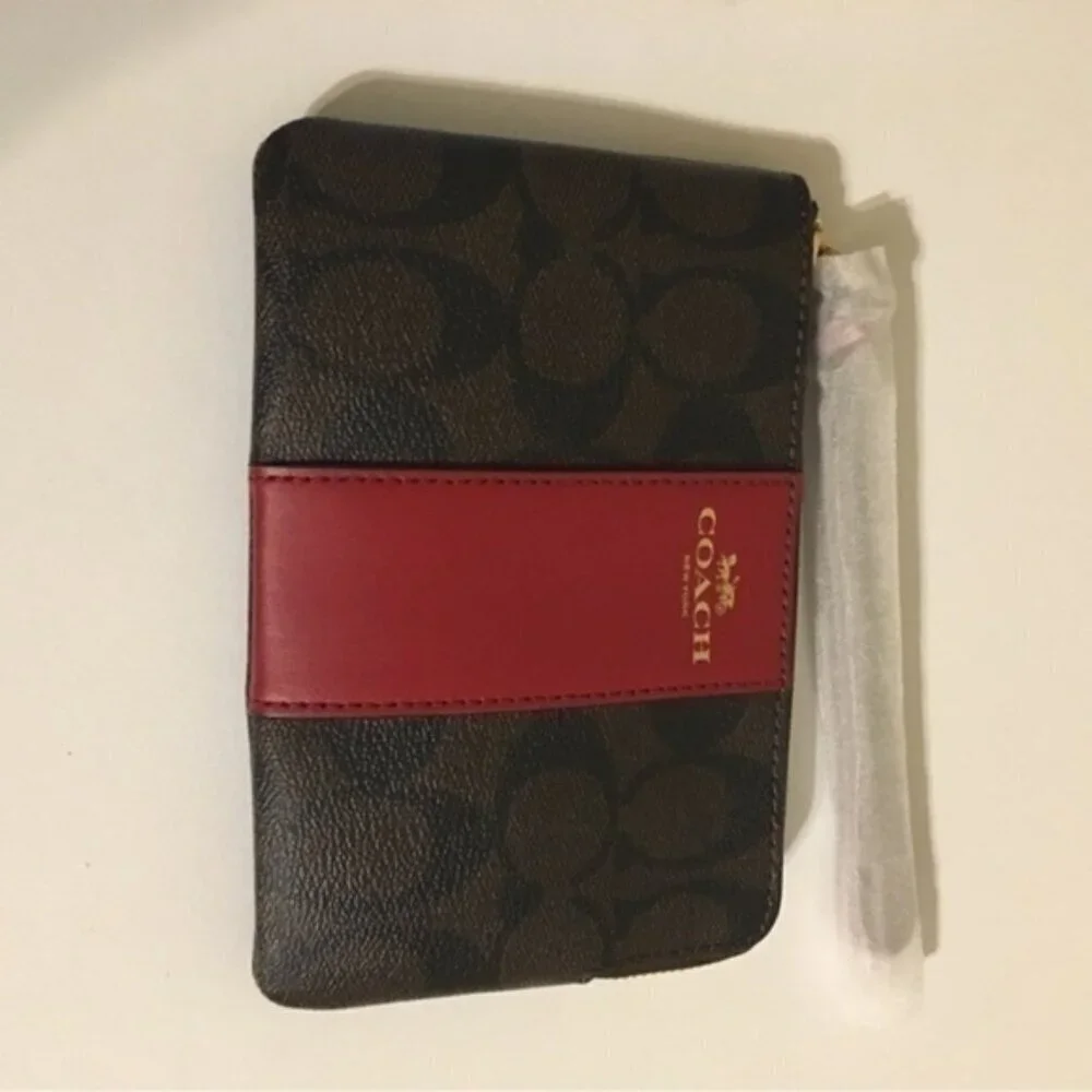 Coach signature coated canvas wristlet